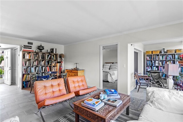 living room with ornamental molding