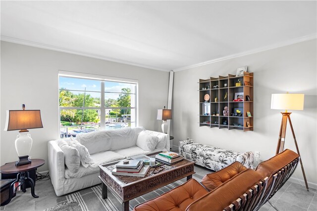 tiled living room featuring crown molding