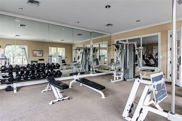 exercise room with ornamental molding