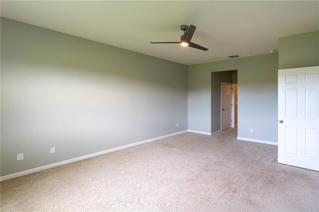 2115 Crowned Eagle Cir SW, Vero Beach, FL 32962 - unfurnished bedroom featuring carpet and ceiling fan