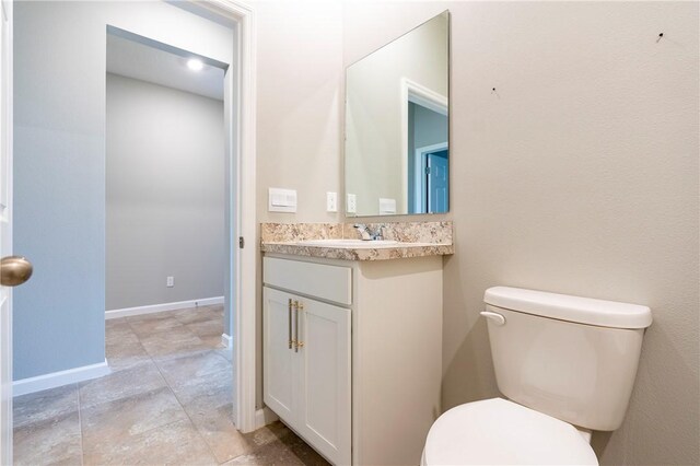 2115 Crowned Eagle Cir SW, Vero Beach, FL 32962 - bathroom featuring toilet and vanity