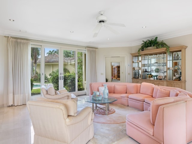 living room featuring ceiling fan and crown molding