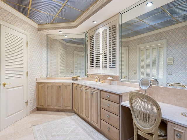 bathroom with tile patterned flooring, vanity, and crown molding