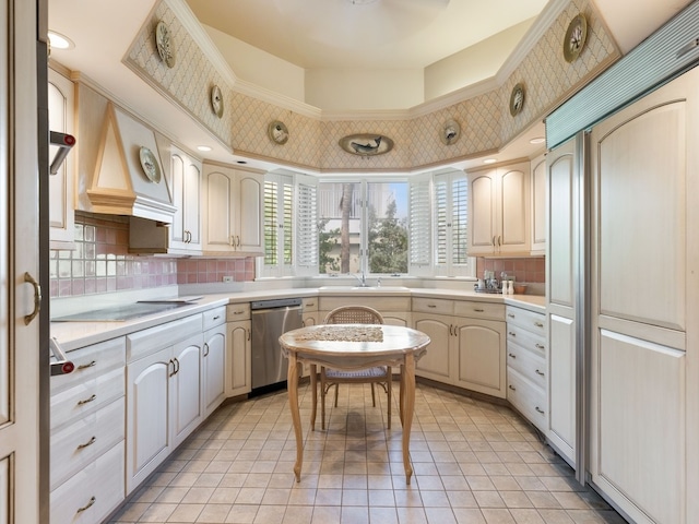 kitchen with dishwasher, sink, tasteful backsplash, light tile patterned floors, and stovetop