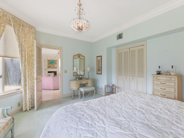 carpeted bedroom with a closet, an inviting chandelier, and crown molding