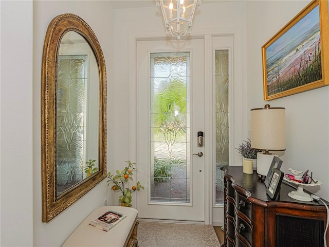 2284 Timberlake Cir, Vero Beach, FL 32966 - entryway with a chandelier