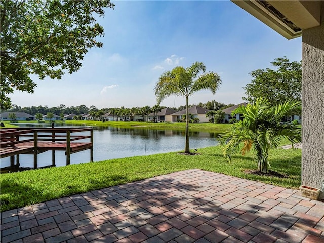 2284 Timberlake Cir, Vero Beach, FL 32966 - view of patio featuring a residential view and a water view