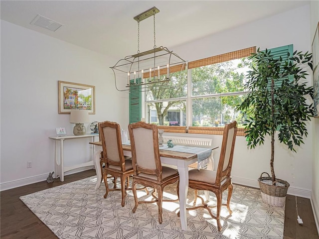 2284 Timberlake Cir, Vero Beach, FL 32966 - dining room with a chandelier and wood finished floors