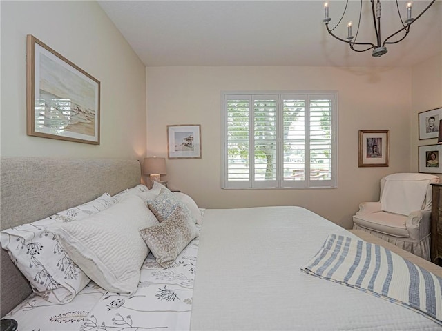 2284 Timberlake Cir, Vero Beach, FL 32966 - bedroom featuring a chandelier