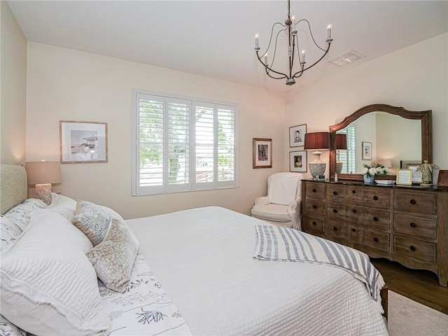 2284 Timberlake Cir, Vero Beach, FL 32966 - bedroom featuring a chandelier and wood finished floors