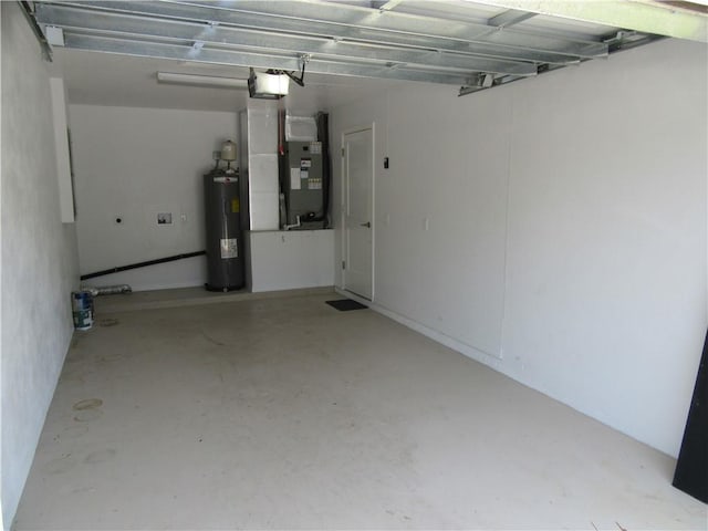 1465 24th Ave SW, Vero Beach, FL 32962 - garage with water heater, a garage door opener, and heating unit