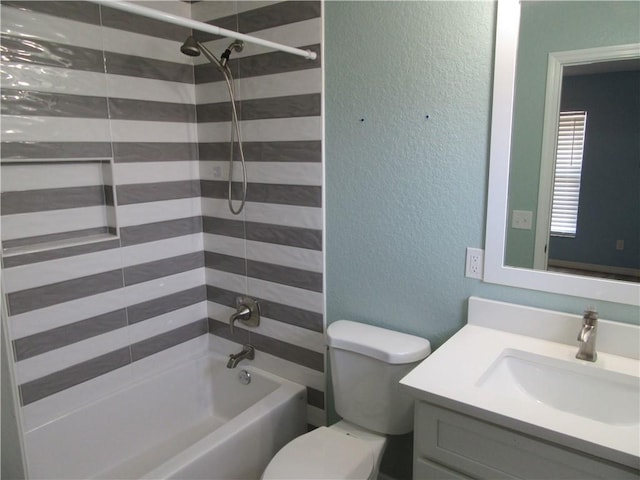 1465 24th Ave SW, Vero Beach, FL 32962 - full bathroom featuring a textured wall, vanity, bathtub / shower combination, and toilet