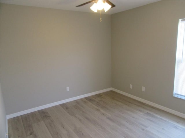 1465 24th Ave SW, Vero Beach, FL 32962 - spare room featuring ceiling fan, light wood-style flooring, and baseboards