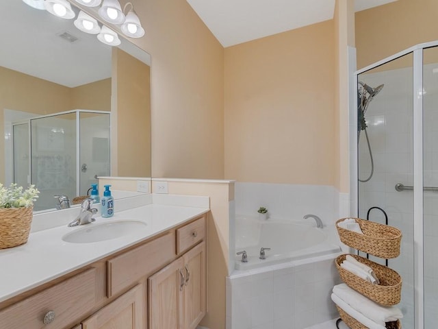7639 15th Ln, Vero Beach, FL 32966 - full bathroom featuring a shower stall, vanity, and a bath