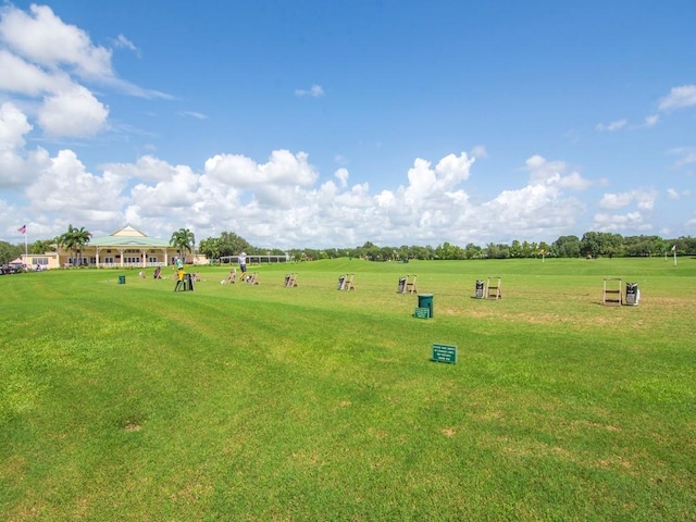 7639 15th Ln, Vero Beach, FL 32966 - surrounding community with a yard