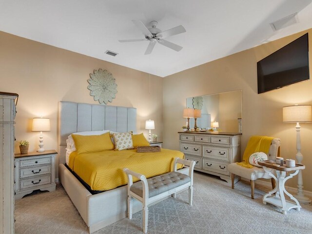 7639 15th Ln, Vero Beach, FL 32966 - bedroom featuring light colored carpet and ceiling fan