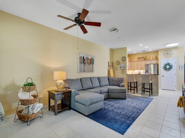 7639 15th Ln, Vero Beach, FL 32966 - living area featuring light tile patterned flooring, ceiling fan, baseboards, and recessed lighting