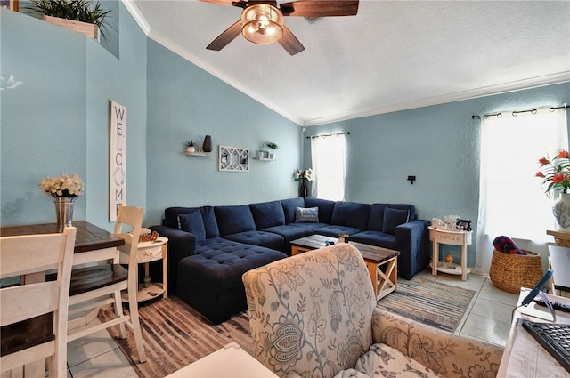 1346 22nd Ave SW, Vero Beach, FL 32962 - living room featuring lofted ceiling, crown molding, ceiling fan, and tile patterned flooring