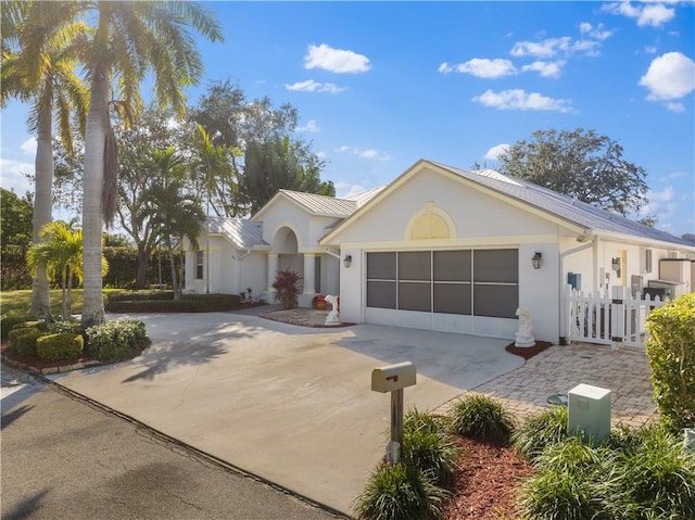 single story home with a garage