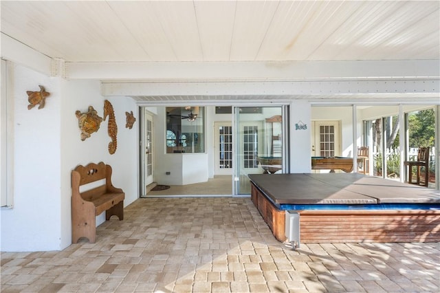 interior space featuring beam ceiling