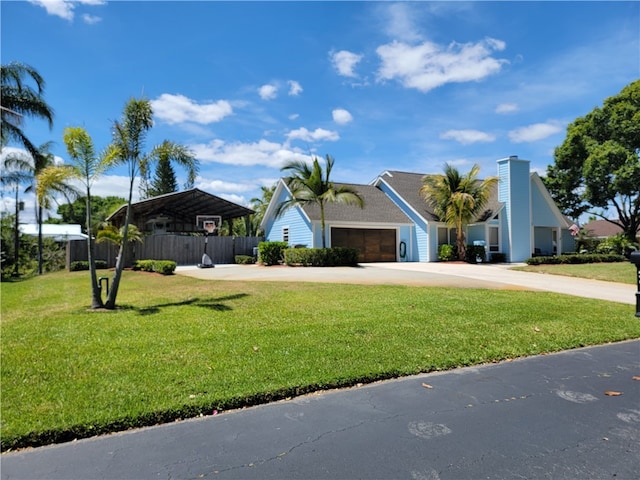 ranch-style home with a front yard, a garage, and a carport