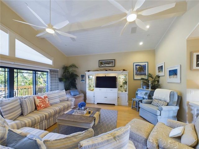 living room featuring crown molding, ceiling fan, and light wood-type flooring