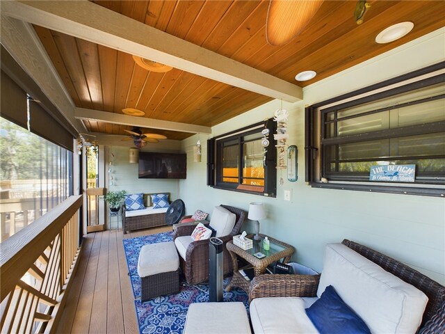 wooden deck featuring an outdoor hangout area