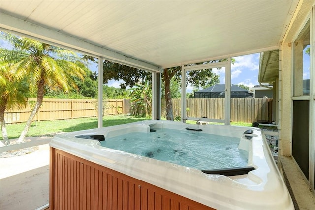 exterior space featuring a jacuzzi