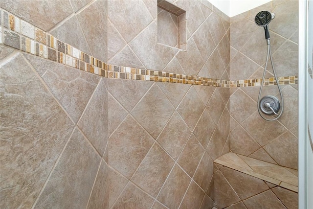 details featuring a tile shower