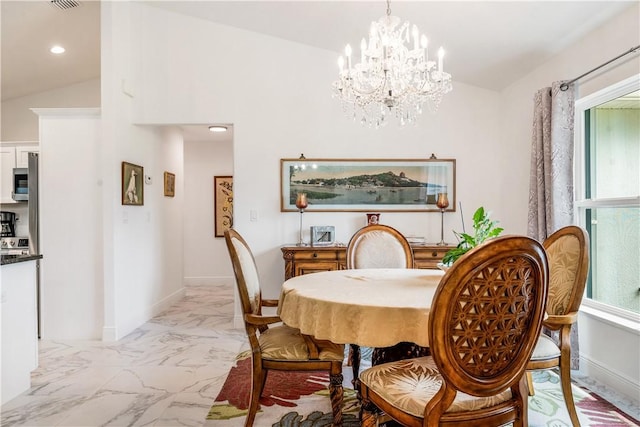 760 Holden Ave, Sebastian, FL 32958 - dining room with lofted ceiling, a chandelier, light marble finish floors, and recessed lighting