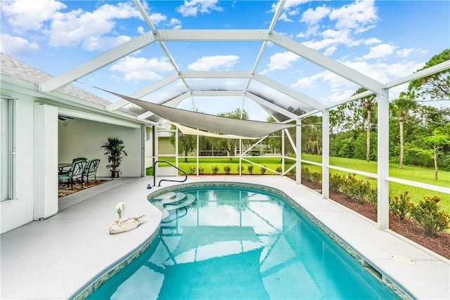 760 Holden Ave, Sebastian, FL 32958 - swimming pool featuring a yard, a patio area, and a lanai