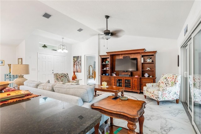 760 Holden Ave, Sebastian, FL 32958 - living area featuring a ceiling fan, a chandelier, vaulted ceiling, and light marble finish flooring