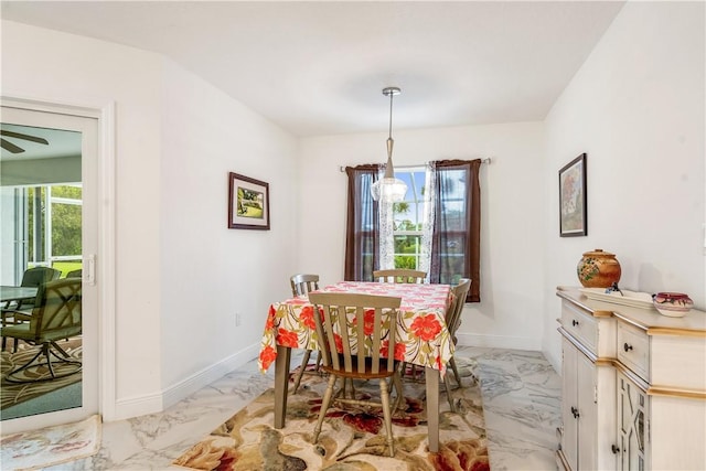 760 Holden Ave, Sebastian, FL 32958 - dining space featuring light marble finish floors and a ceiling fan