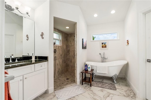 760 Holden Ave, Sebastian, FL 32958 - full bath with walk in shower, marble finish floors, vanity, a freestanding tub, and recessed lighting
