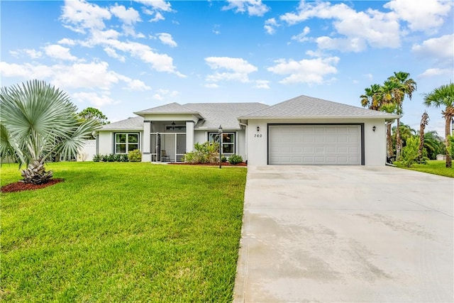 760 Holden Ave, Sebastian, FL 32958 - view of front of house featuring an attached garage, a front yard, driveway, and stucco siding