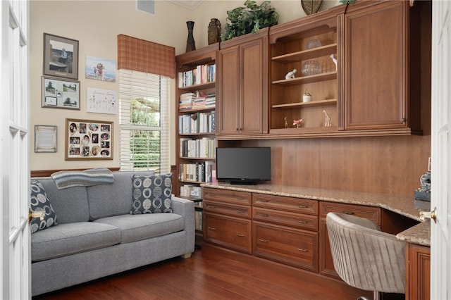 interior space featuring dark wood-type flooring and visible vents