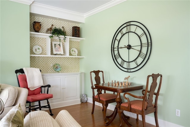 dining space with baseboards, dark wood-type flooring, and crown molding