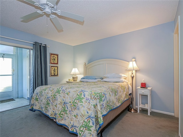 bedroom featuring a textured ceiling, ceiling fan, carpet flooring, baseboards, and access to exterior