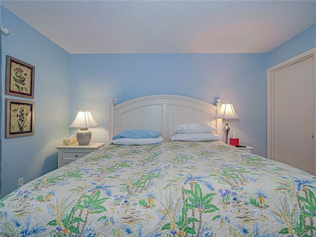 bedroom with a textured ceiling