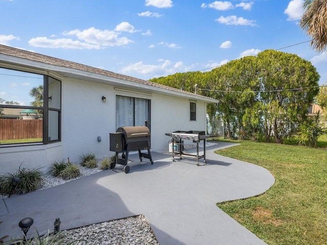 view of patio / terrace with fence and grilling area