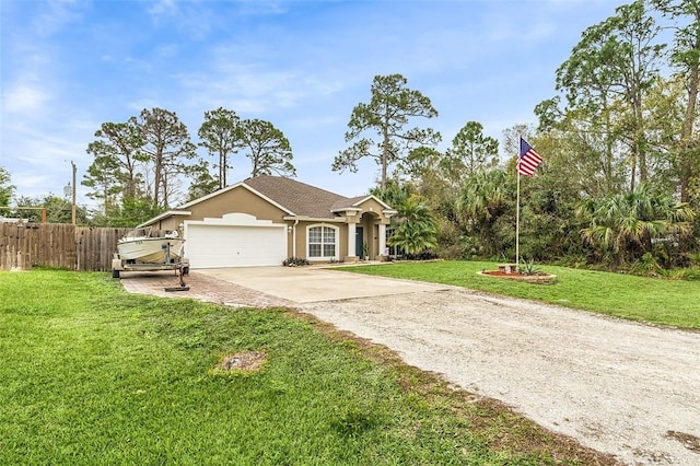 view of front of house with stucco siding, fence, concrete driveway, an attached garage, and a front yard