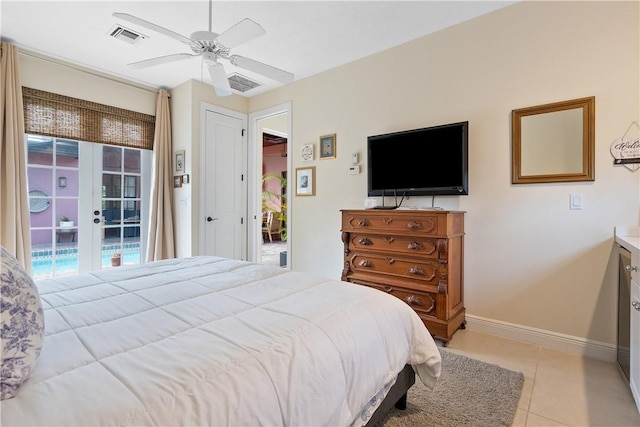 bedroom with ceiling fan, access to exterior, light tile patterned floors, and french doors