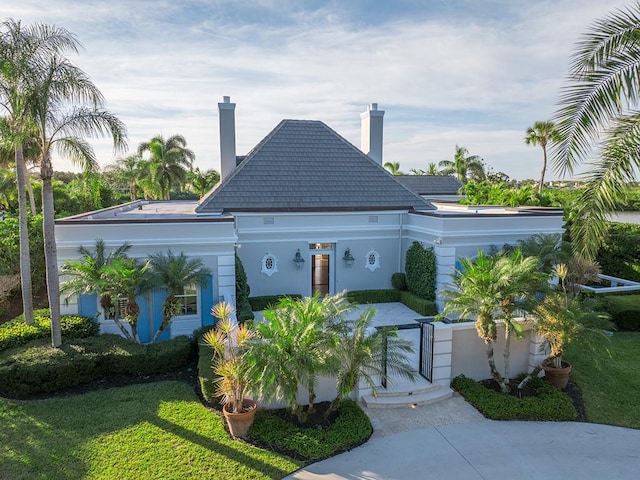 exterior space with a front lawn