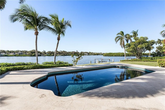 view of pool featuring a water view