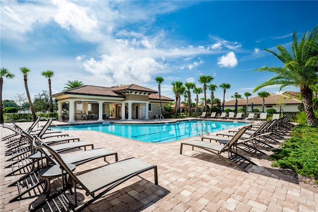 view of swimming pool featuring a patio