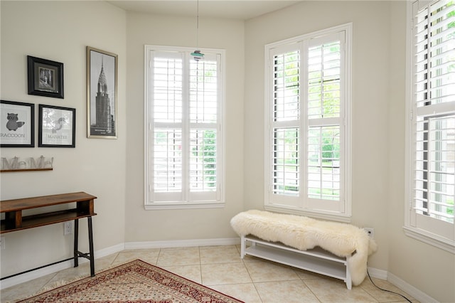 living area with light tile patterned floors