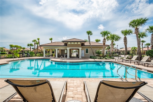 view of swimming pool featuring a patio