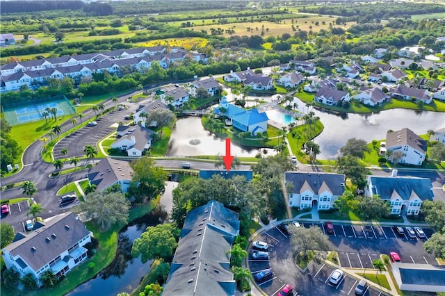 aerial view featuring a water view and a residential view