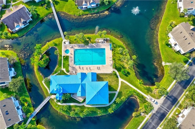 drone / aerial view with a water view