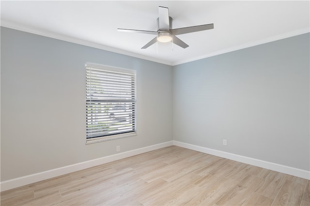 spare room featuring crown molding, ceiling fan, and light hardwood / wood-style flooring